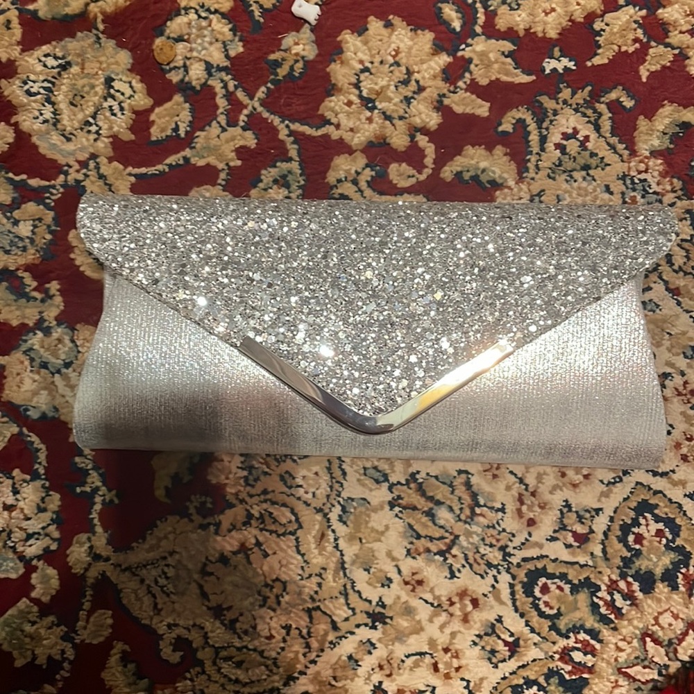 Silver clutch. Brand new.